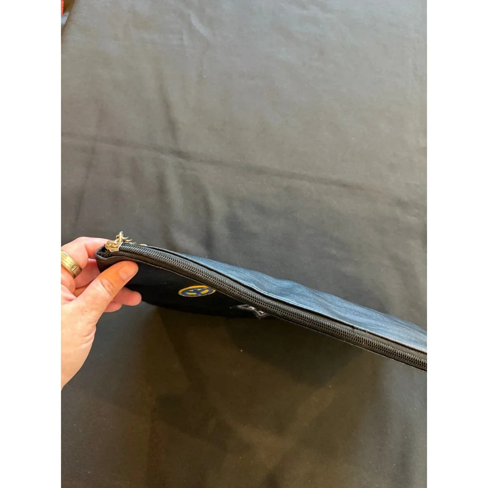 Black Faux Leather Patch Clutch Bag with Tassel Zipper Pull and Interior Pockets